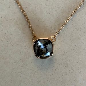 Gold necklace with gem